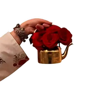 A hand holding bunch of flowers for wedding in Siliguri