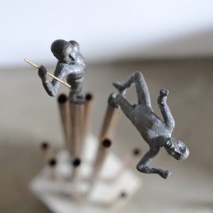 Escultura lucha por el poder