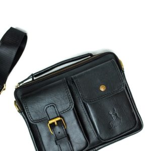 genuine leather satchel bag side profile adjustable strap