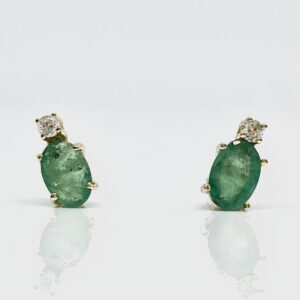 14ky .64ctw Emerald and .06ctw Diamond Stud Earrings