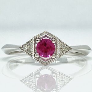 14kw .27ct Ruby and .04ctw Diamond Ring