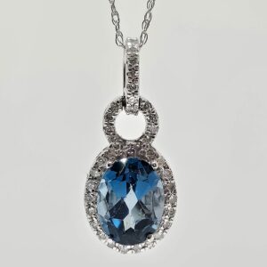 10k 1.40ct Blue Topaz and .15ctw Diamond Halo Necklace
