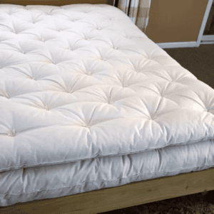 wool mattress topper (topper is on top)