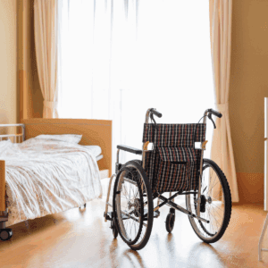 Medical cleaning service with wheelchair and bed in a sanitised healthcare setting