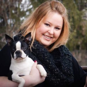 A woman with her Boston Terrier. Boston Terrier Model