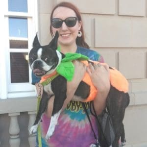 a girl with her Boston Terrier.