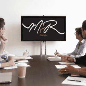 meeting of people watching a presentation