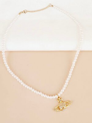 Collier planète en strass doré