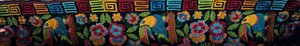 Traditional Mayan textile with vibrant bird and floral embroidery from Guatemala