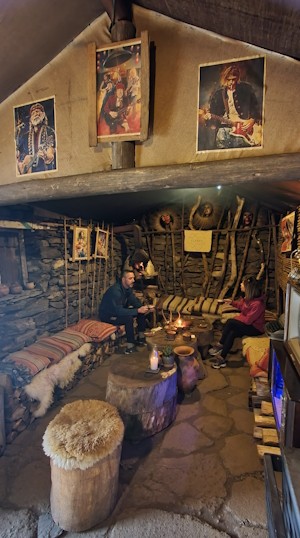 The eclectic interior of the stone hut cafe is very surprising