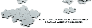 Puzzle pieces forming a roadmap for building a data strategy without big budgets.