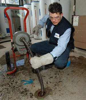 Sewer cleaning Drain Rescue Sewer backup in basement floor