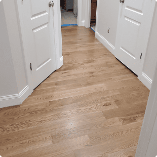 Finished hardwood floors in hallway