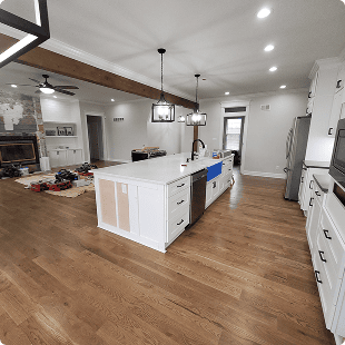 Natural flooring in kitchen and living area