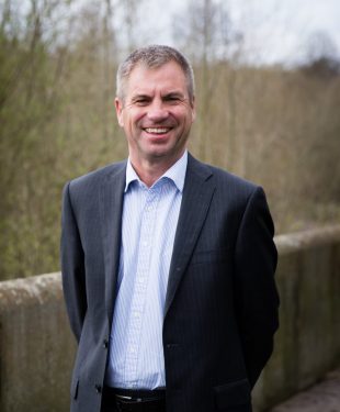 Guy Thomas, Construction & Engineering Specialist Solicitor photographed on Chester City walls.