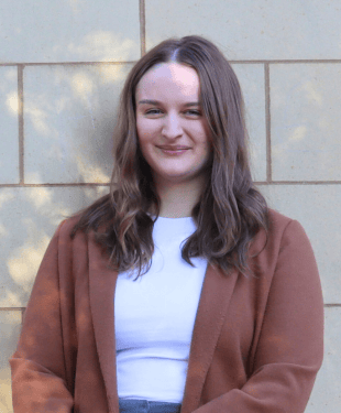 Holly Morris Commercial Property Paralegal Photographed outside DTM Legal in Chester