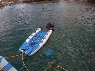 SNUBA air-supply raft floating at the surface