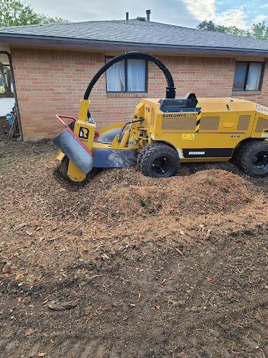 Backyard stump grinding in Wichita KS with compact stump grinder
