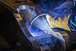 Image of live welding with semi-auto MIG gun