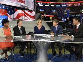 T.J. Holmes and Amy Robach Defend David Muir Wearing A Clothespin on Coat
