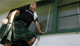 clean window men in kilts