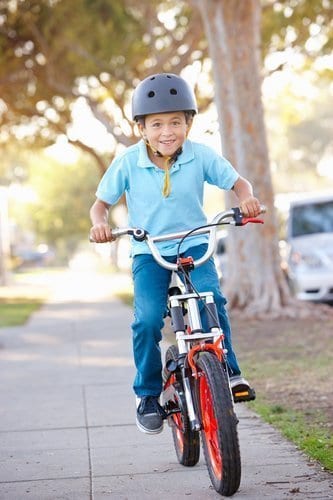 kid riding a bicycle