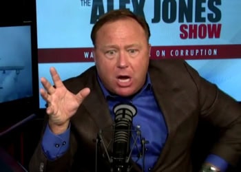 Two psychological factors explain why education predicts decreased belief in conspiracy theories