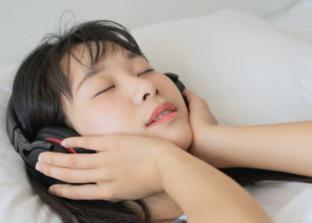 Listening to happy or sad music before bed appears to be beneficial to sleep quality