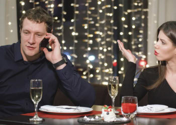 “Phone snubbing” your partner can lead to a vicious cycle of resentment and retaliation, study suggests