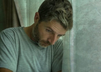 Loneliness predicts an increase in TV viewing for older women, but not for men