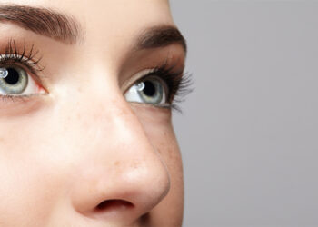 People judge faces with more visible eye whites as more trustworthy and attractive