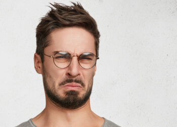 ChatGPT, Claude, Grok, and Gemini overrate facial attractiveness compared to human judges