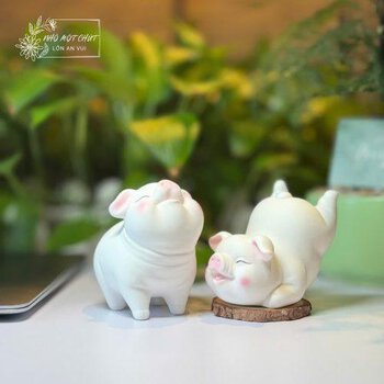 Cặp heo gốm trắng decor góc làm việc nhỏ
