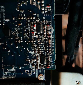 Detailed image of a circuit board showing intricate patterns and components.