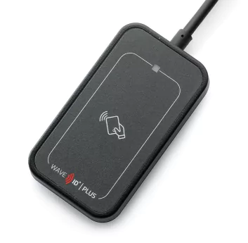 A black device is connected to the charger.