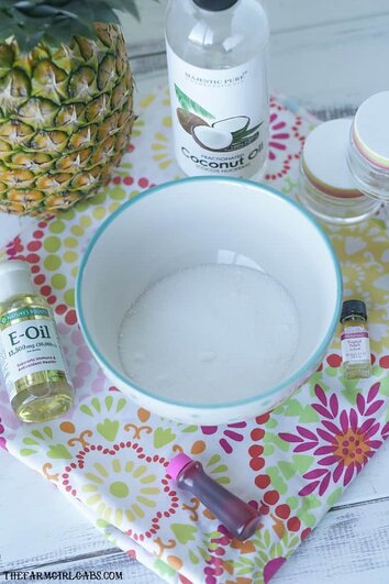 Sooth and exfoliate those chapped lips with this easy DIY Tropical Punch Lip Scrub that you can make at home. #DIY #essentialoils #scrub #lipscrub #beauty