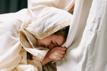 Featured Image for Blog women in white clinging to man in white robe