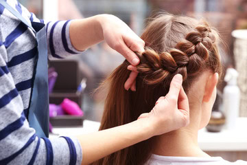 Braiding little girl hair