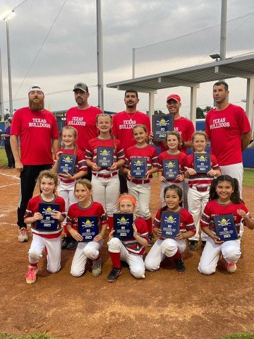 Houston girls softball team holding championship awards 2023