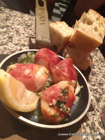 Capesante con parma: Scallops wrapped in Parma ham in garlic butter with warm focaccia Pontis Italian Oxford Circus