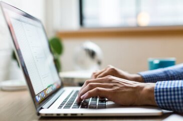 person using macbook