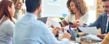 in-person meeting of a franchise leadership team