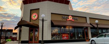 image of the exterior of a just love coffee cafe franchise