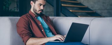 person reading articles about franchising