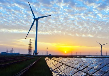 Wind turbines generating renewable energy on a coastal wind farm for the power industry
