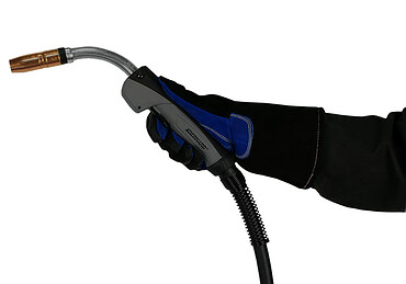 Gloved hand holding a Bernard BTB semi-automatic air-cooled MIG gun with C series handle