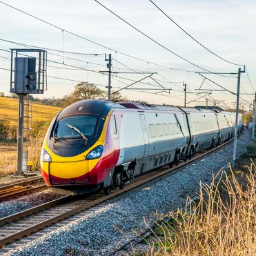 Freight train on railway tracks transporting goods as part of the rail logistics industry