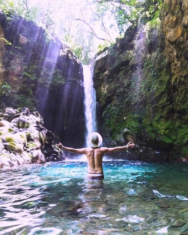 Beautiful blue waterfalls and magical rainforest trails at Sensoria Land of Senses, Costa Rica.