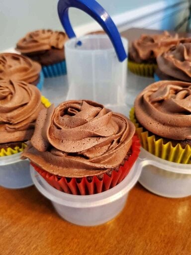 Chocolate cupcakes in cupcake caddy