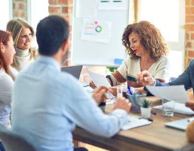 in-person meeting of a franchise leadership team